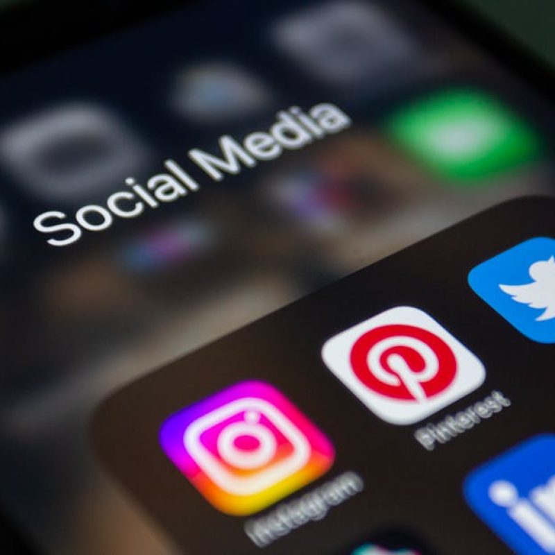 A smartphone screen displaying popular social media applications like Instagram and Twitter.